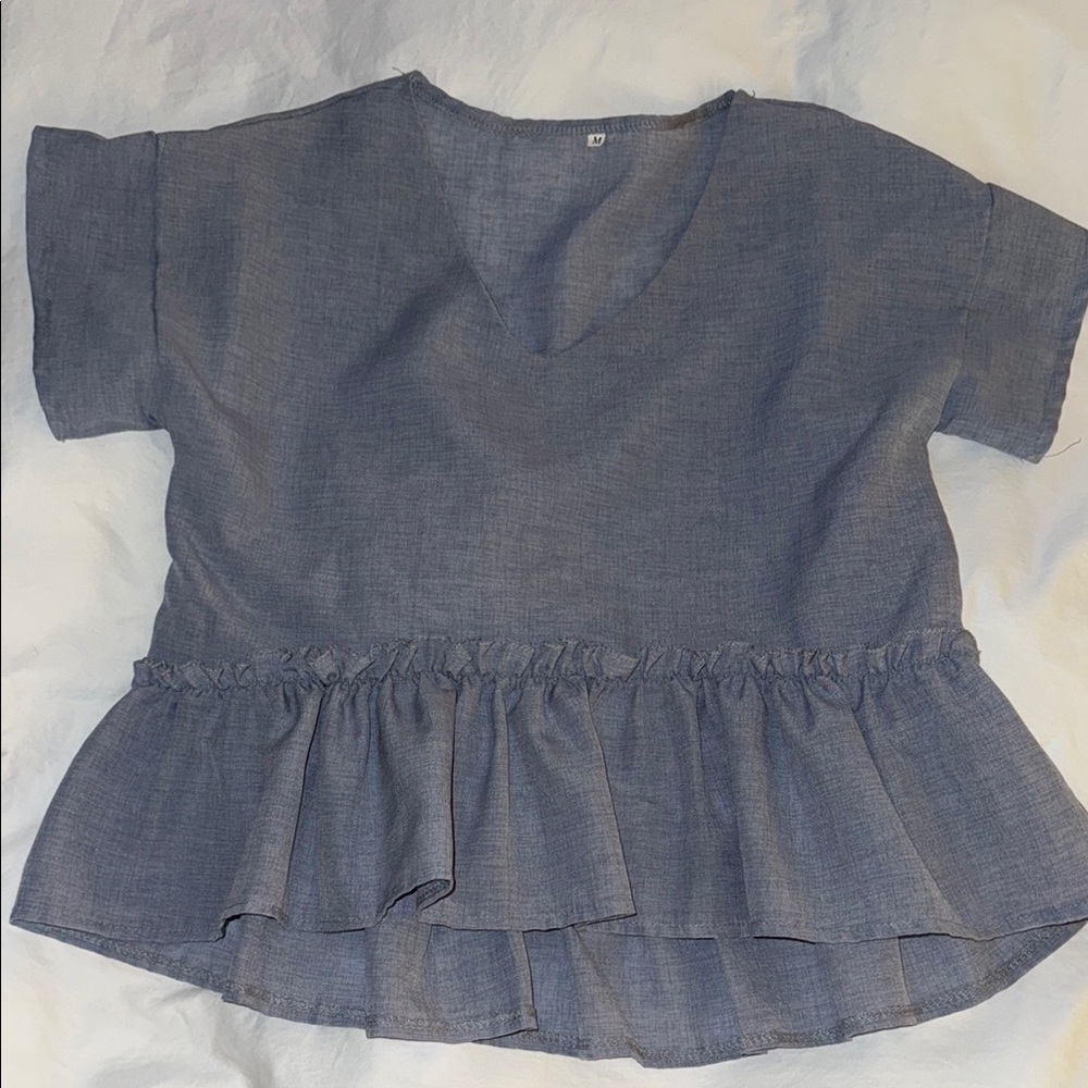 Blue Ruffle Hem Blouse